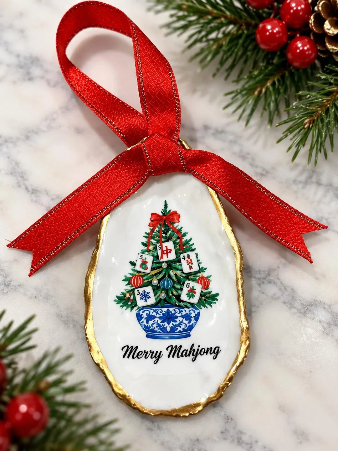 Oyster shell ornament decoupaged with a Mahjong design