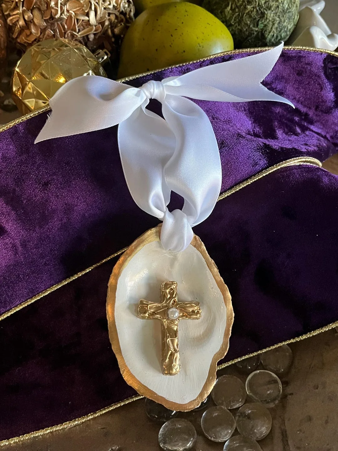 A handcrafted oyster shell cross by ML Designs